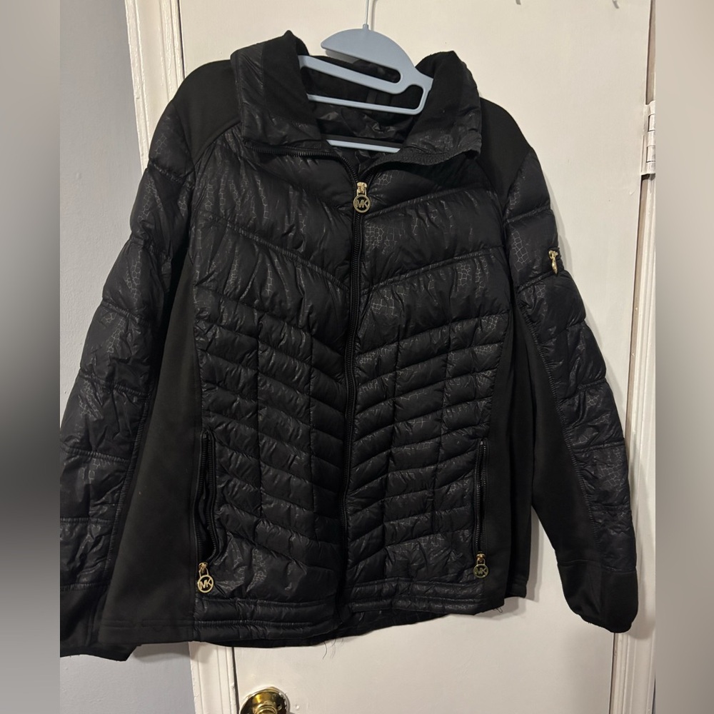 Black Quilted Lightweight Michael Kors Jacket with Gold Accents.